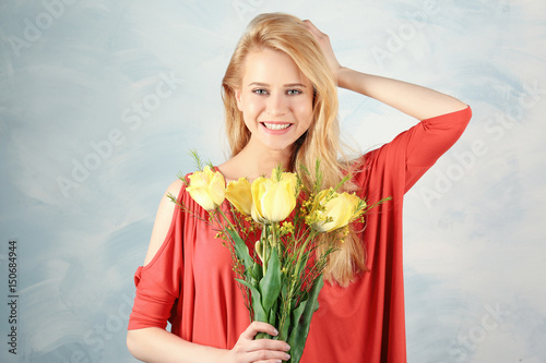 Beautiful young woman with ...