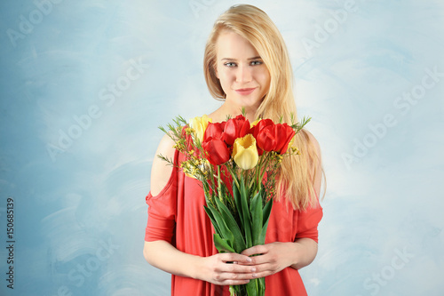 Beautiful young woman with ...
