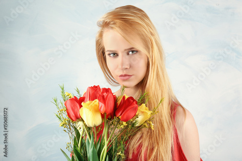Beautiful young woman with ...