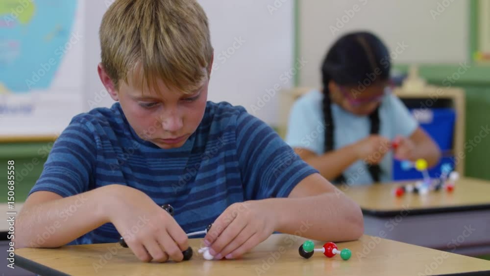 Children in school classroom building science models Children in school classroom building science models