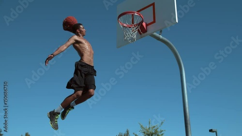 Super slow motion shot of basketball basketball slam dunk, shot on Phantom Flex 