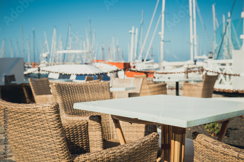 Table and chairs in marina Rubicon in Playa Blanca, Lanzarote, Canary Island, Spain