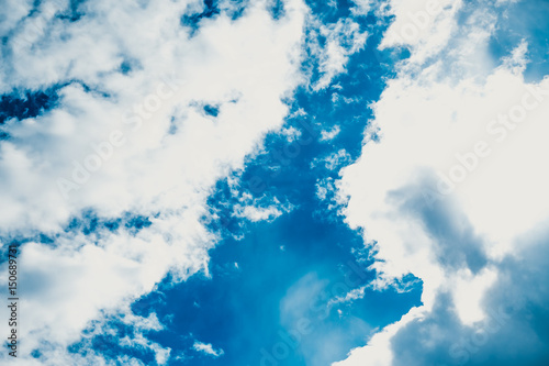 blue sky with clouds closeup. Beautiful bakcground photo