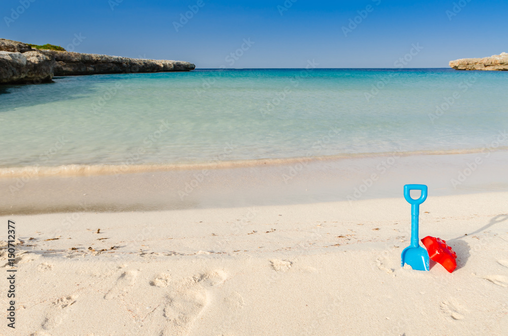 toys on the beach, summer day, Menorca, Spain toys on the beach, summer day, Menorca, Spain