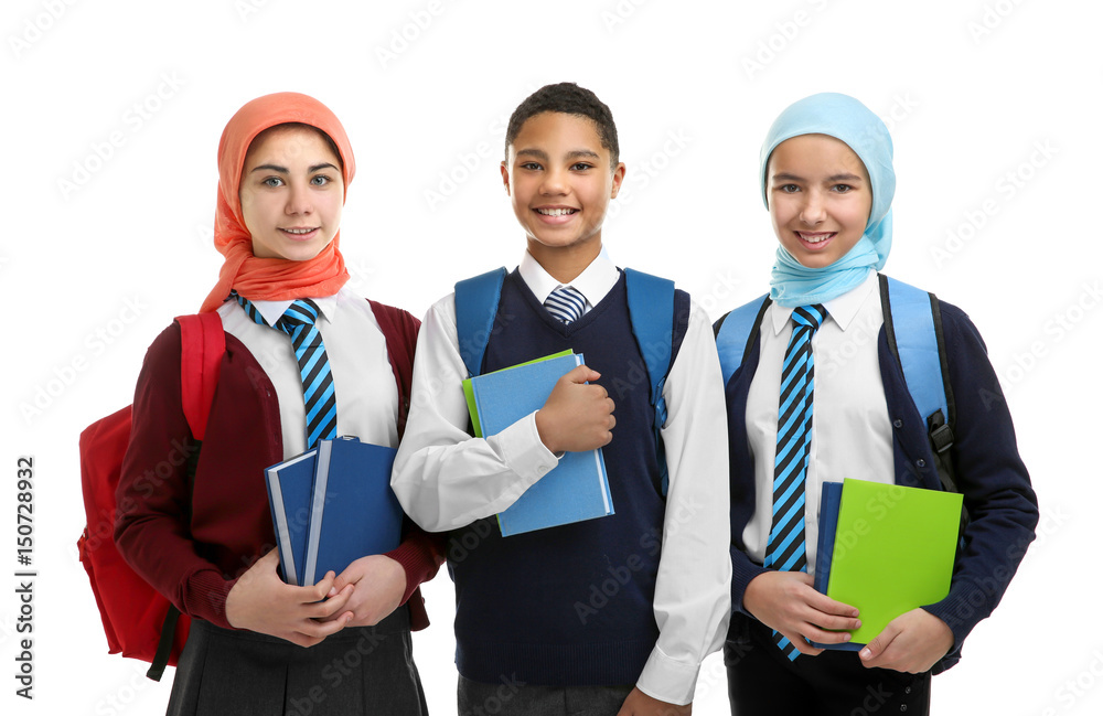 Schoolchildren with books on white background