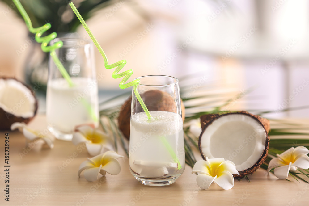 Beautiful composition with coconut water on table Beautiful composition with coconut water on table