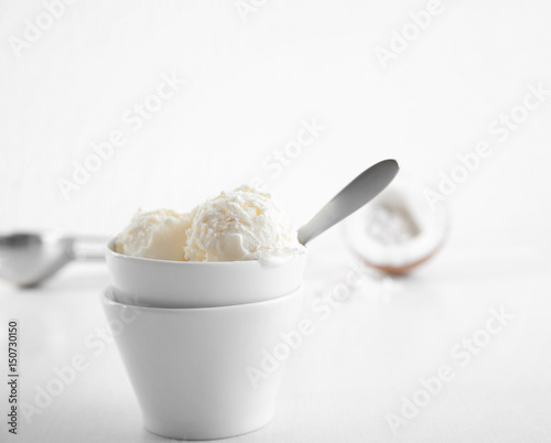 Fresh coconut ice cream on white background