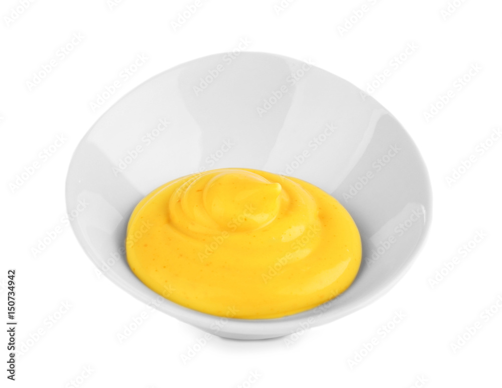 Bowl with cheese sauce on white background