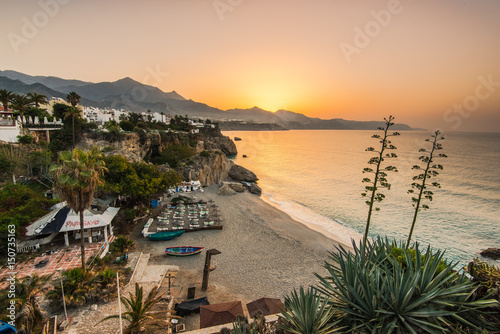 Beautiful sunrise over beach in Nerja,Andalusia,Spain photo