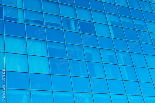 Modern office building with tinted windows, exterior view