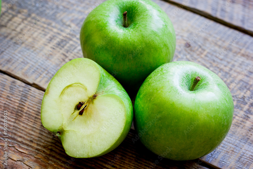 summer food with green apples on wooden background summer food with green apples on wooden background