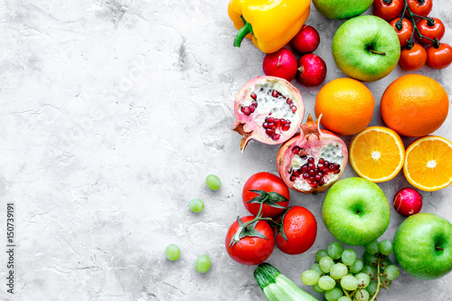 cooking salad with fresh fruits and vegetables on stone background top view mock-up