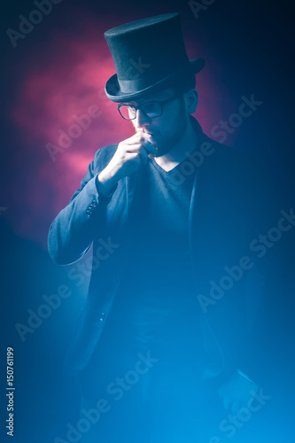 The man smoke an electronic...