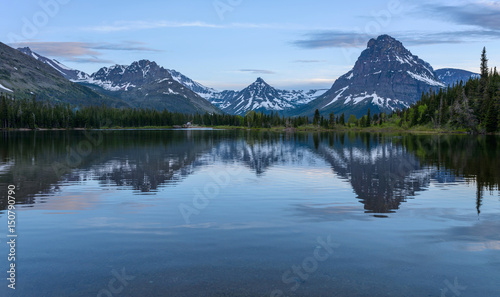 Pray Lake - A spring evening view of Pray Lake and its surrounding mountains at Two Medicine Valley region of Glacier National Park  Montana  USA.