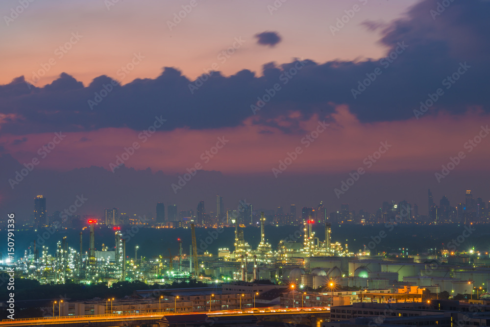 Oil refinery industry with cityscape twilight sky background, Bangkok, Thailand.