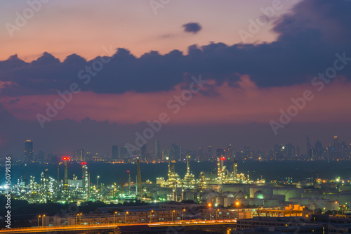 Oil refinery industry with cityscape twilight sky background  Bangkok  Thailand.