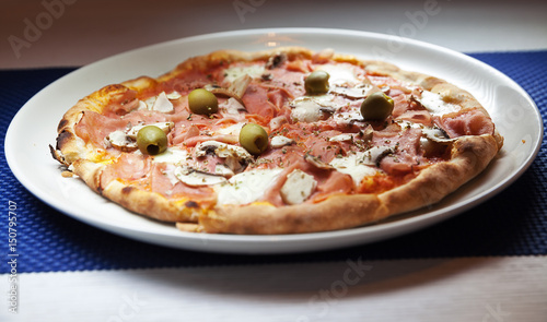 Pizza With Ham and Olives