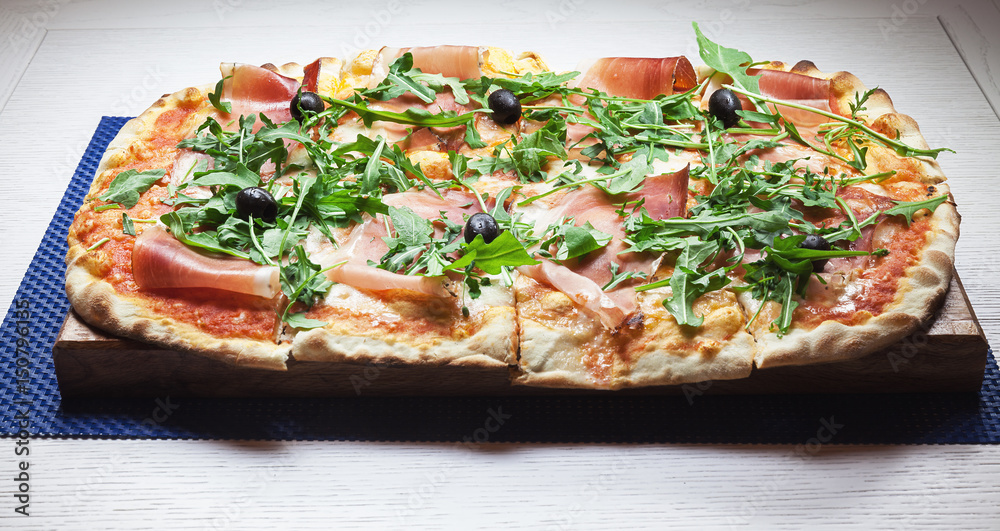 Pizza With Ham, Parsley and Olives