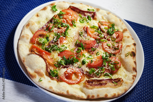 Pizza With Bacon, Tomato and Pepper