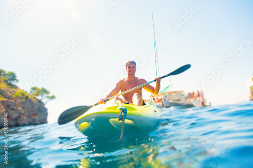 Young Man Canoeing