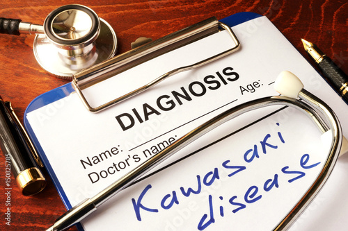 Kawasaki disease written in a document on a table.