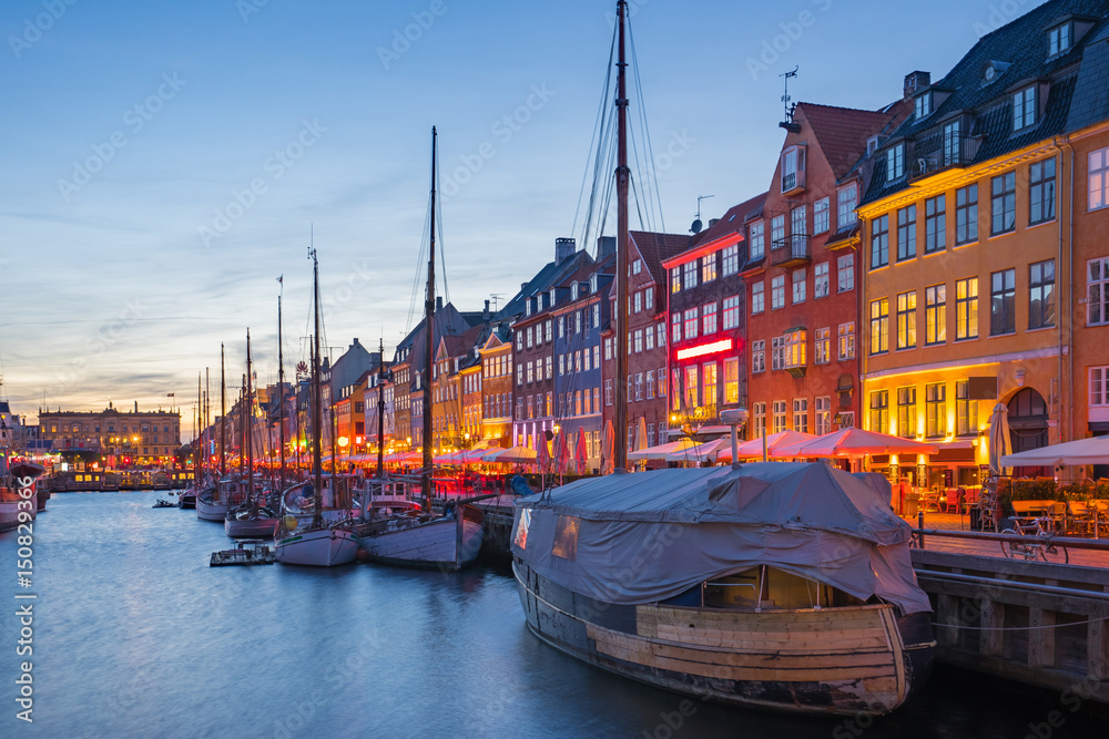 Nyhavn Canal at night in Copenhagen city, Denmark