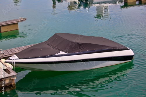 Boat on calm sea  in Cascais Bay, Cascais, Portugal