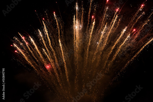 Amazing colorful fireworks on a night sky black background