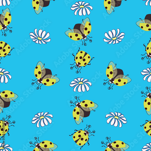 Yellow ladybug and chamomile. Seamless pattern on a blue background. Design for textiles, tapestries, packaging materials, bags, purses, products for children. © velishchuknatali