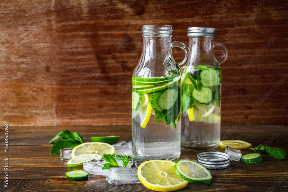 Refreshing taste of lime, lemon and cucumber in small glass bottles Refreshing taste of lime, lemon and cucumber in small glass bottles