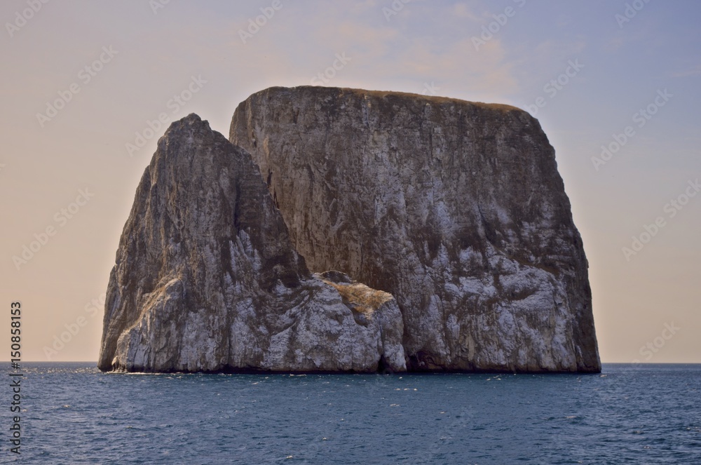 Kicker Rock (Leon Dormido), a striking volcanic rock formation off San Cristobal in the Galapagos Islands, Ecuador Kicker Rock (Leon Dormido), a striking volcanic rock formation off San Cristobal in the Galapagos Islands, Ecuador