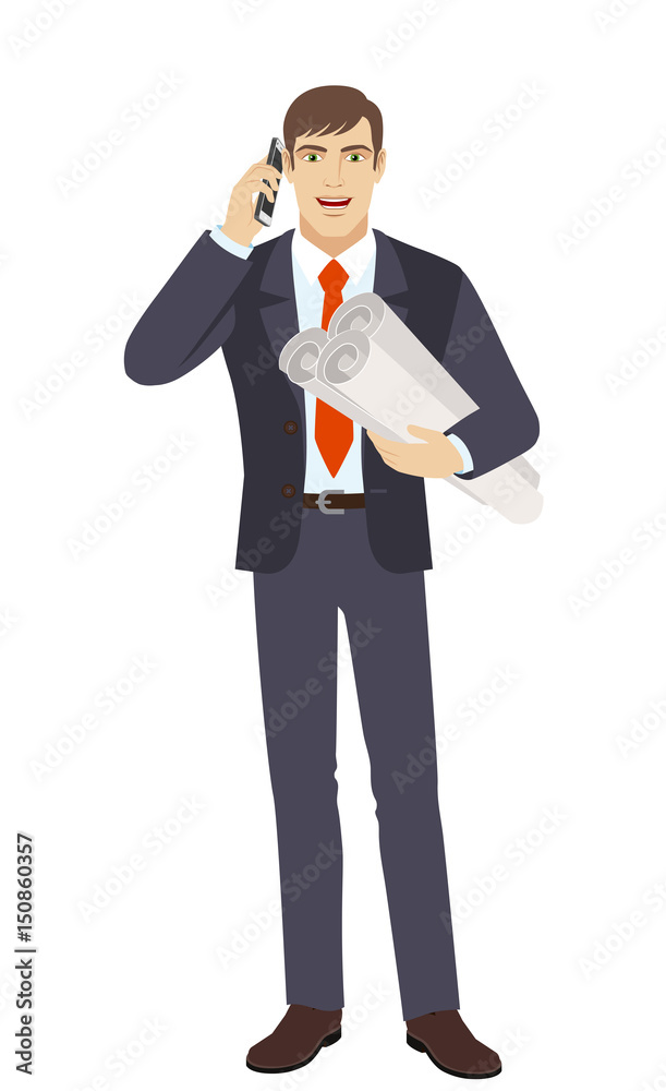 Businessman holding the project plans and talking on the mobile phone Businessman holding the project plans and talking on the mobile phone