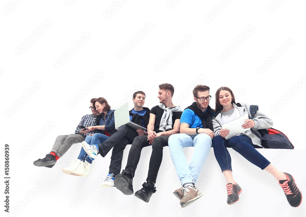 Causal group of people sitting on the floor isolated