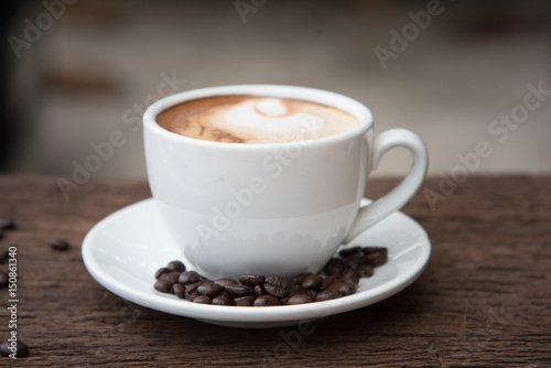 Coffee cup and beans