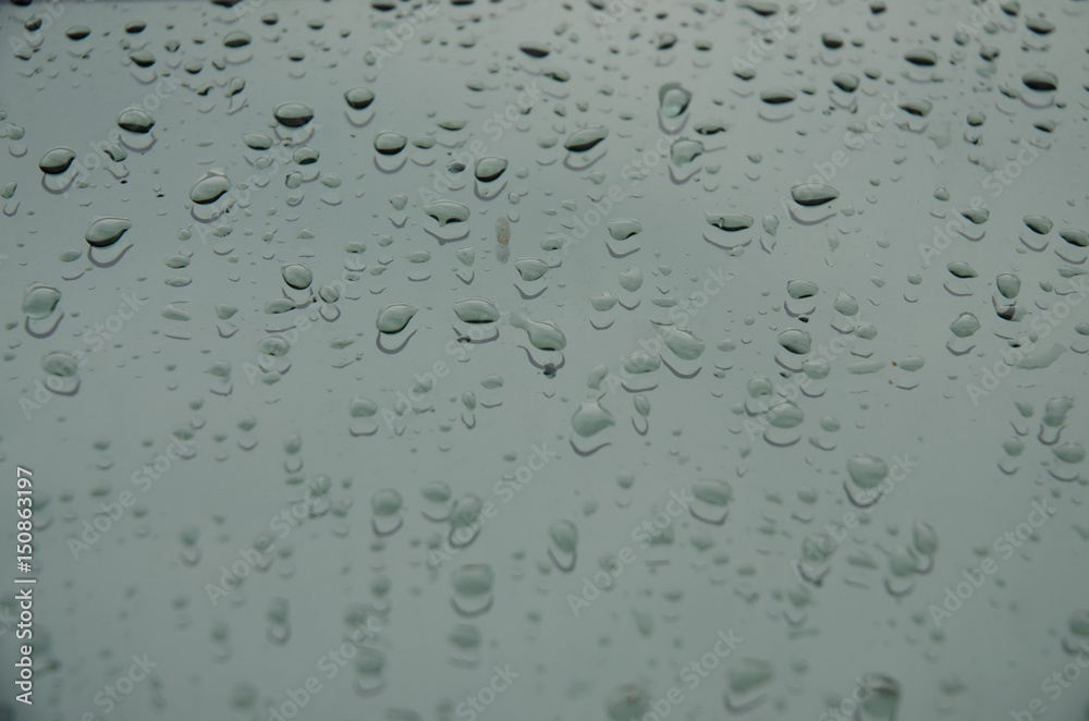Rain drops on a car window Rain drops on a car window