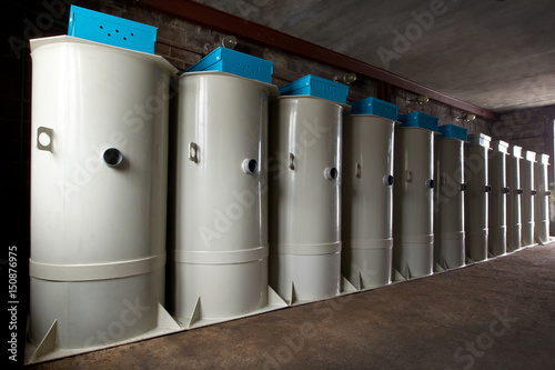 A row of european septic tank stations (autonomous sewage system) at warehouse