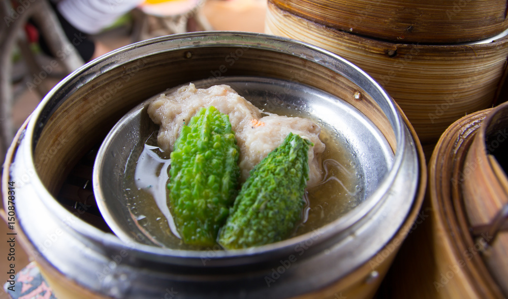 Dim sum in bamboo steamer- Chinese cuisine