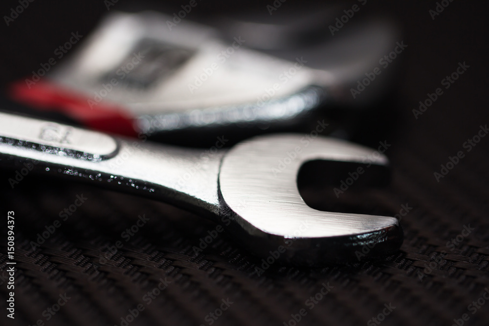 Wrench on wooden table Wrench on wooden table