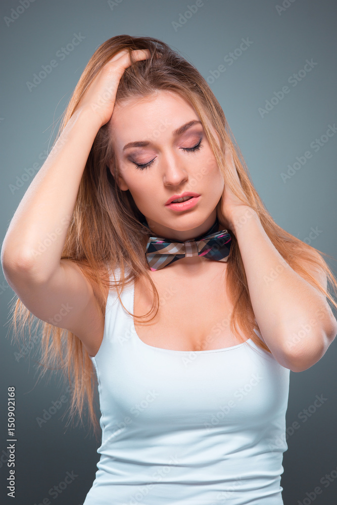 Obraz premium The young woman's portrait with Seductive emotions