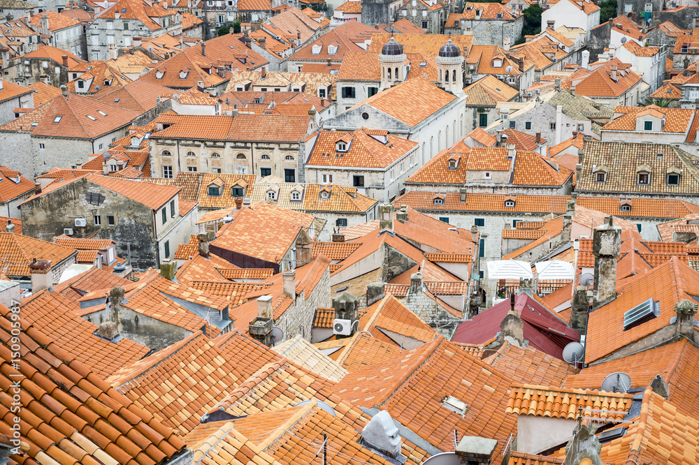 Scenic view of the traditional terra cotta rooftops of the medieval walled old city of Dubrovnik, Croatia