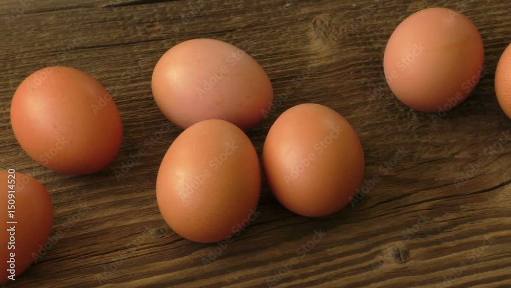 Brown eggs on wooden background
Brown eggs on wooden background