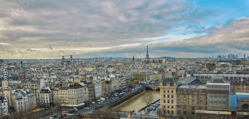 A view of the city from the roof of Notre Dame. City landscape, Eiffel Tower, Paris, beautiful clouds.