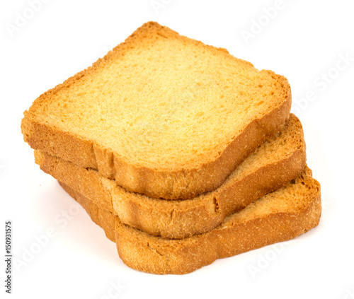 Obraz na plátně still life of golden rusk in a white background