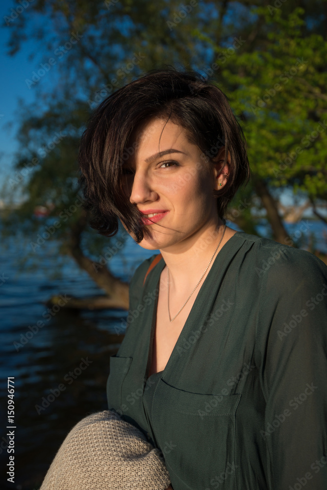 Portrait of amazing multiracial woman on the river bank Portrait of amazing multiracial woman on the river bank