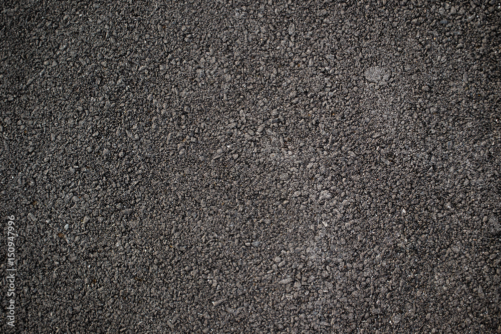 New asphalt road surface close up for background. New asphalt road surface close up for background.