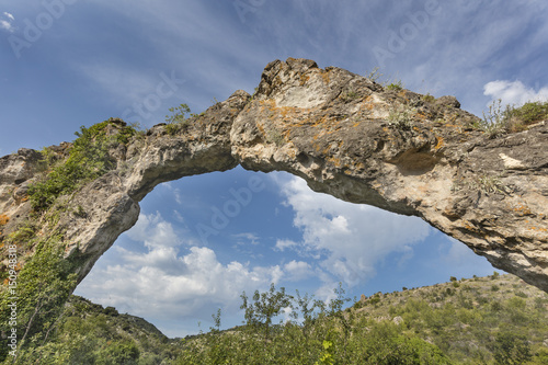 Natural phenomenon called Kolac (cake) on island Brac in Dalmatia, giant stone arch, Croatia
