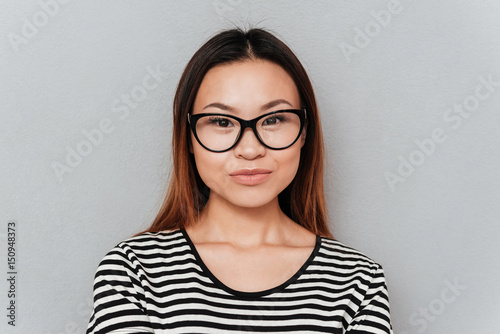 Portrait of calm pretty asian woman