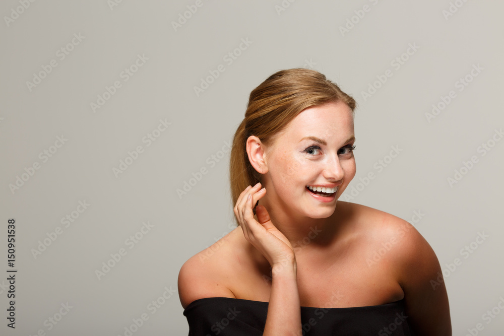 Smiling girl in black dress