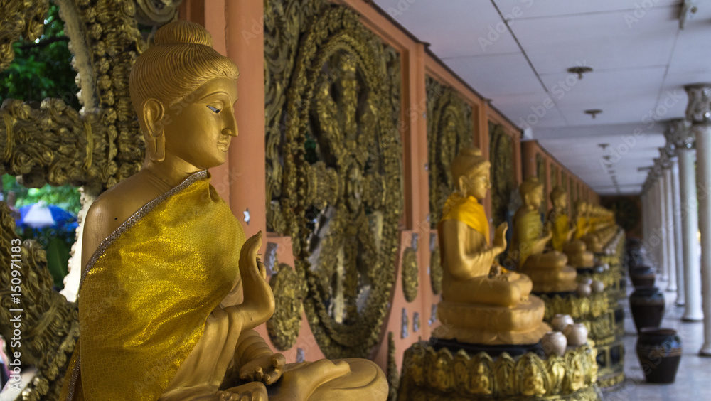 Group of Buddha statues in temple, Bangkok Thailand