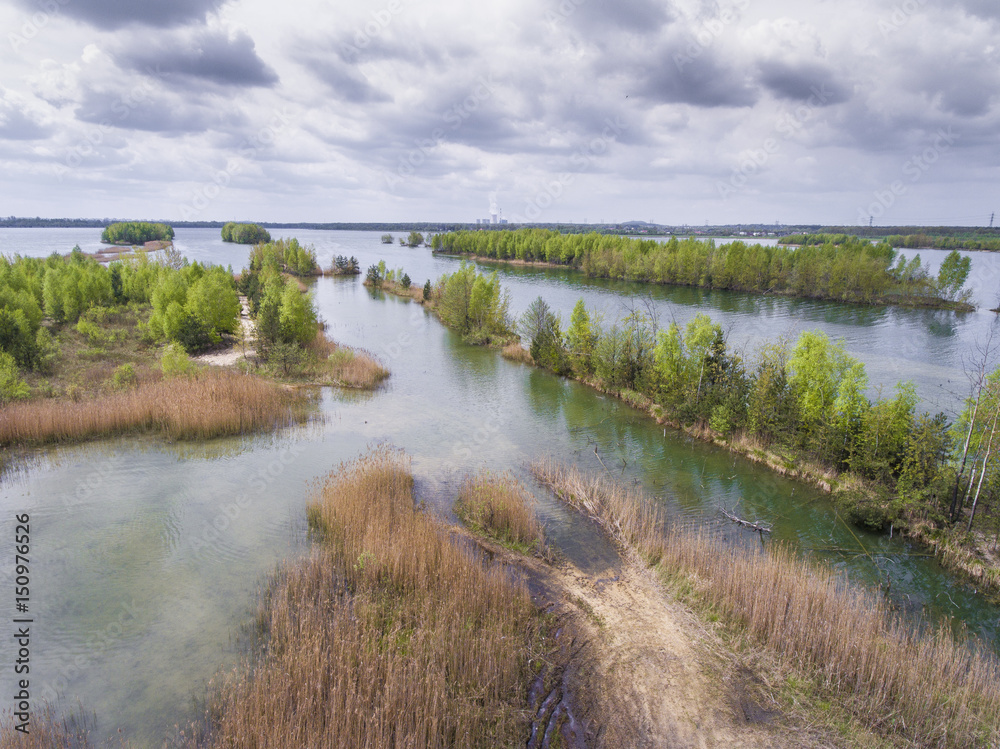 Lake and forest during spring time. View from above. Pogoria IV in Dabrowa Gornicza, Poland. Lake and forest during spring time. View from above. Pogoria IV in Dabrowa Gornicza, Poland.